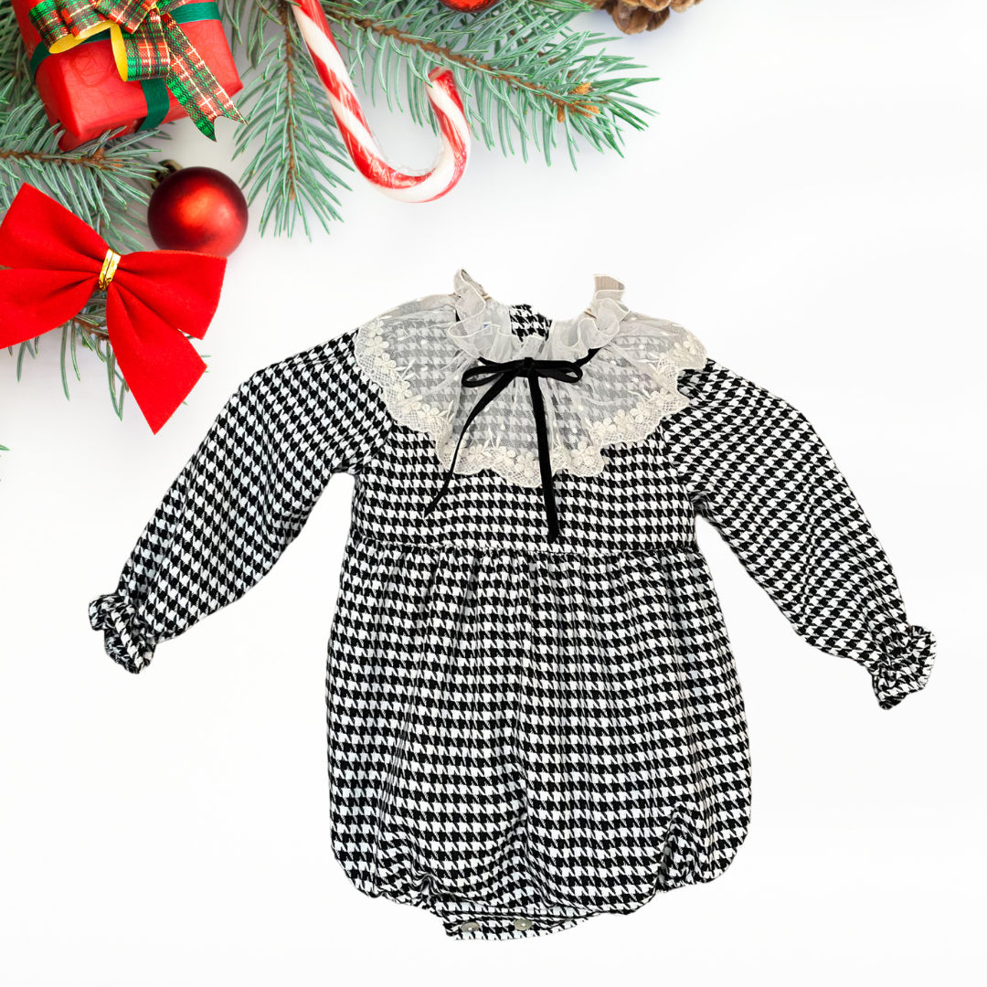 black and white houndstooth romper with lace accent for toddler girls